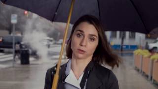 Unhappy Woman With Umbrella In Rain