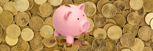 Piggybank On Top Of Coins