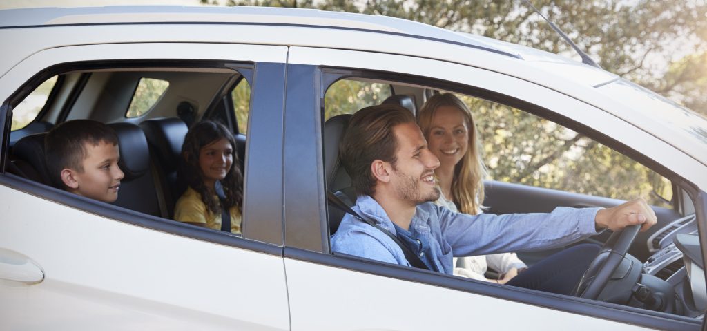 family in minivan