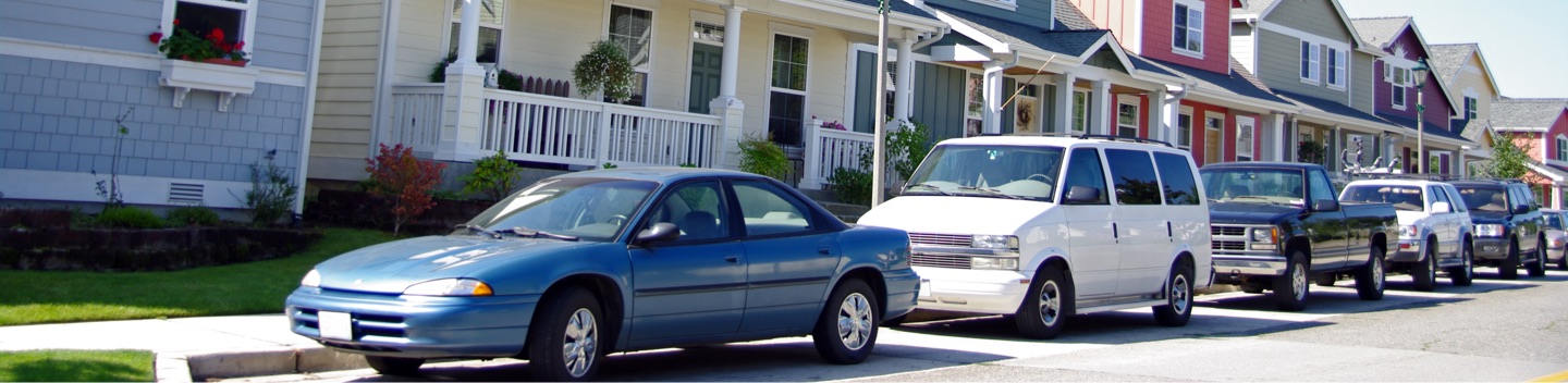 Vehicles Parked On A Residential Street