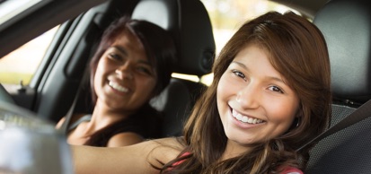 Driver And Passenger Smiling
