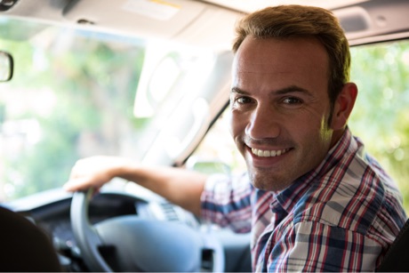 Driver Smiling At Camera